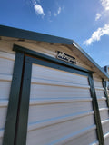 06x08 Steel Storage Shed in White Siding and Green Trim
