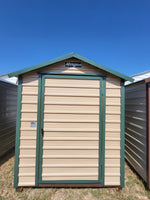 06 x 06 Steel Storage Shed in Tan Siding and Green Trim