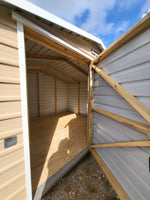 10 x 12 Peak Storage in Tan Steel with White Trim and Window