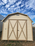 06 x 06 Steel Storage Shed in Tan Siding and Green Trim